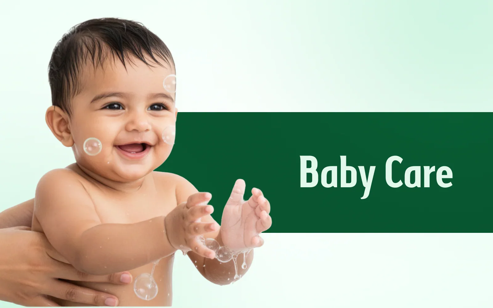 Smiling baby playing with water bubbles, supported by adult hands, on baby care background